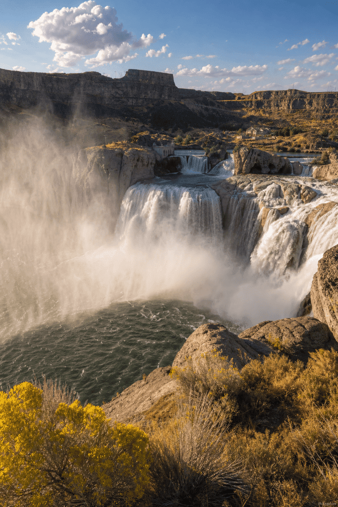 Idaho debt collection agency regions feature Shoshone Falls cascading into a deep rocky canyon under a sunny sky